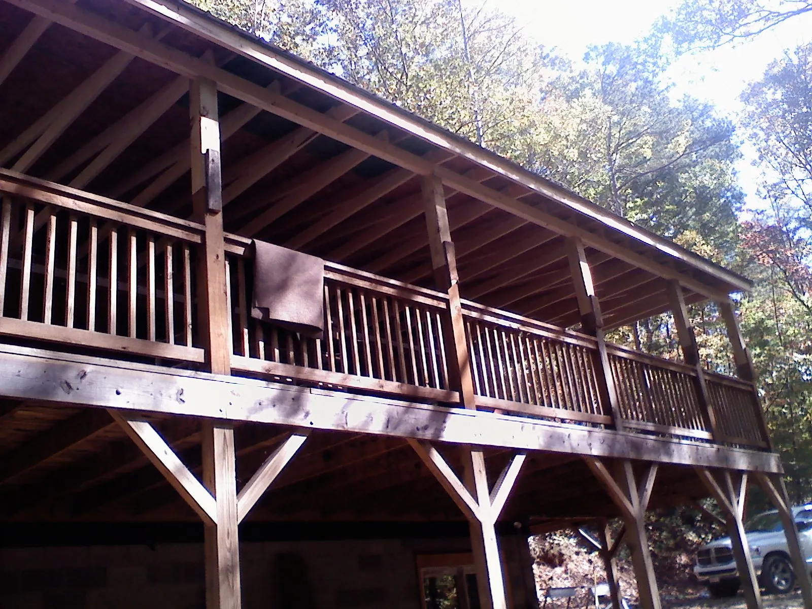 Timber framing under a new elevated porch and deck — Roof Leak Repair in Naytahwaush by Roofing Brothers
